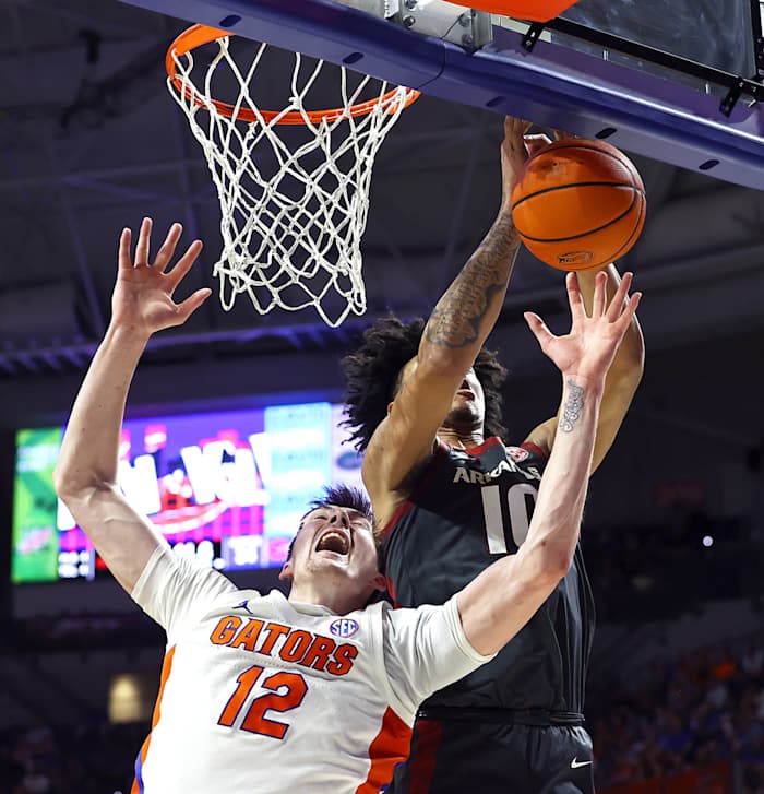 Arkansas Razorback forward Jaylin Williams. Florida center Collin Castleton